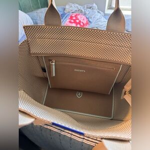 Rothy’s “The Handbag” in coastal mini check in new condition.